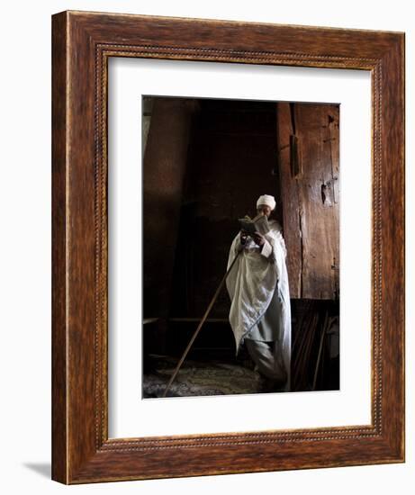 Ethiopia, Lalibela; a Priest in One of the Ancient Rock-Hewn Churches of Lalibela-Niels Van Gijn-Framed Photographic Print