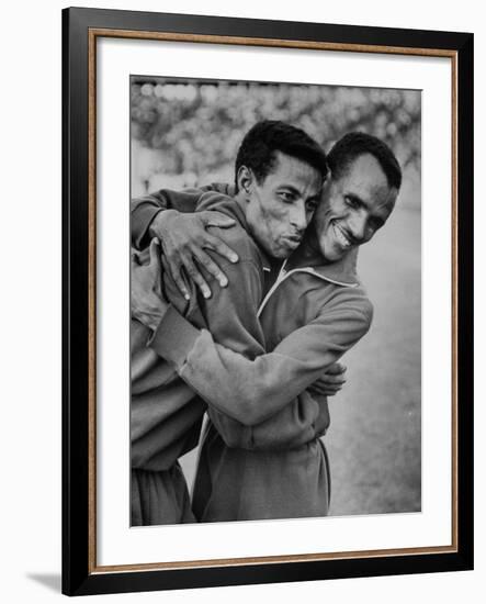 Ethiopian Runners Abebe Bikila and Mamo Wolde During Exhibition Race at Berlin Olympic Stadium-null-Framed Premium Photographic Print