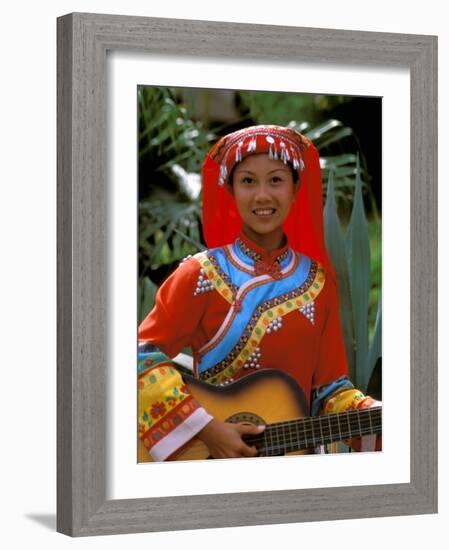 Ethnic Dancer Playing Guitar, Kunming, Yunnan Province, China-Bill Bachmann-Framed Photographic Print