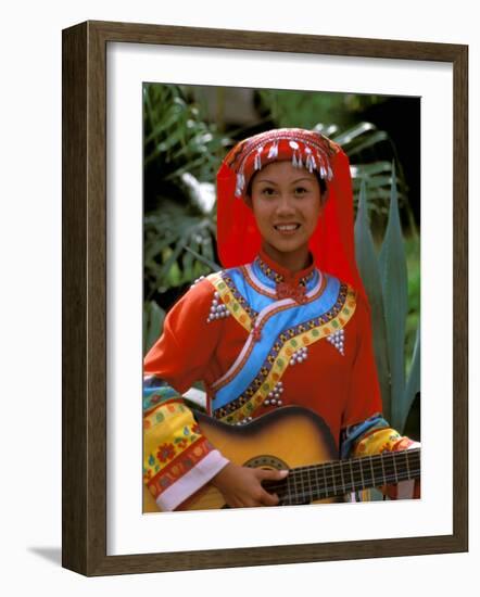 Ethnic Dancer Playing Guitar, Kunming, Yunnan Province, China-Bill Bachmann-Framed Photographic Print