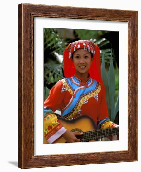 Ethnic Dancer Playing Guitar, Kunming, Yunnan Province, China-Bill Bachmann-Framed Photographic Print