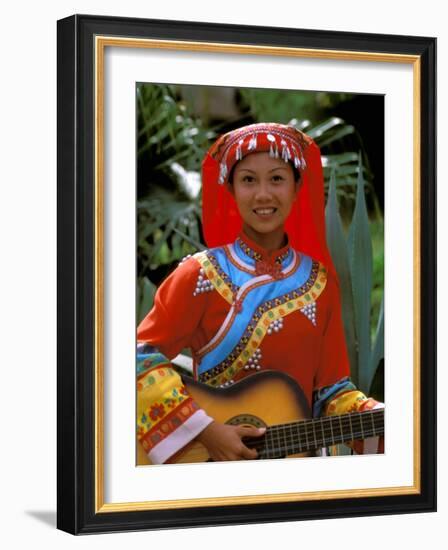 Ethnic Dancer Playing Guitar, Kunming, Yunnan Province, China-Bill Bachmann-Framed Photographic Print