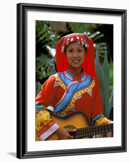 Ethnic Dancer Playing Guitar, Kunming, Yunnan Province, China-Bill Bachmann-Framed Photographic Print