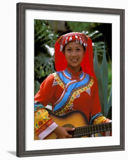 Ethnic Dancer Playing Guitar, Kunming, Yunnan Province, China-Bill Bachmann-Framed Photographic Print