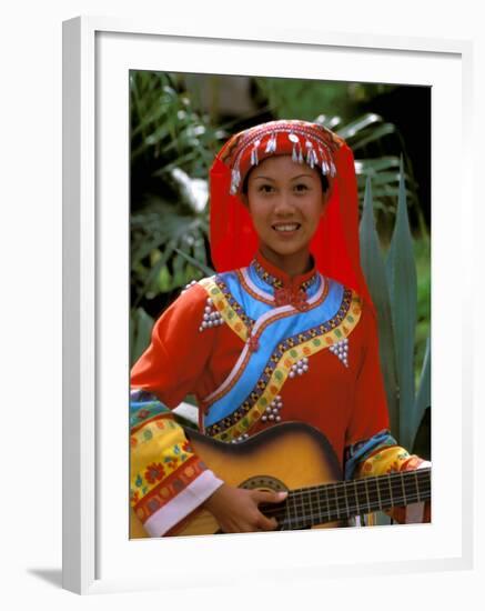 Ethnic Dancer Playing Guitar, Kunming, Yunnan Province, China-Bill Bachmann-Framed Photographic Print