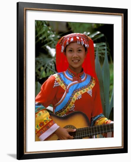 Ethnic Dancer Playing Guitar, Kunming, Yunnan Province, China-Bill Bachmann-Framed Photographic Print