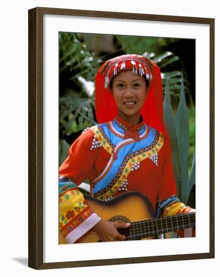 Ethnic Dancer Playing Guitar, Kunming, Yunnan Province, China-Bill Bachmann-Framed Photographic Print