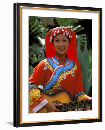 Ethnic Dancer Playing Guitar, Kunming, Yunnan Province, China-Bill Bachmann-Framed Photographic Print