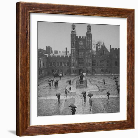 Eton Students in Traditional Tails and Striped Trousers, with Umbrellas, Standing in the Rain-Margaret Bourke-White-Framed Photographic Print