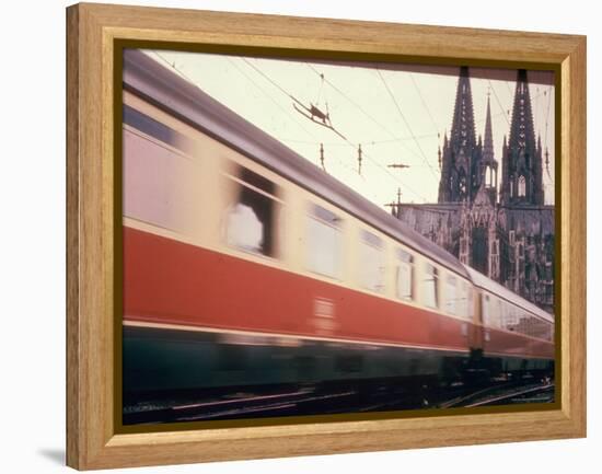 Eurailpass in Europe: Germany's Parsifal Express Speeding Past Cologne Cathedral-Carlo Bavagnoli-Framed Premier Image Canvas