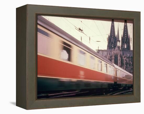 Eurailpass in Europe: Germany's Parsifal Express Speeding Past Cologne Cathedral-Carlo Bavagnoli-Framed Premier Image Canvas