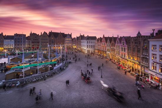 Europe Belgium Brugge Grote Markt Central Sqaure At Sunset With Moving People Photographic Print Aliaume Chapelle Art Com
