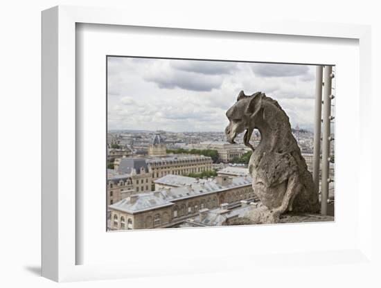 Europe, France, Paris. A gargoyle on the Notre Dame Cathedral.-Charles Sleicher-Framed Photographic Print