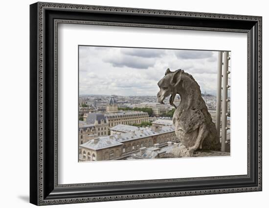 Europe, France, Paris. A gargoyle on the Notre Dame Cathedral.-Charles Sleicher-Framed Photographic Print