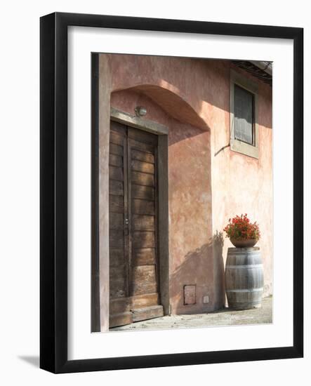 Europe, Italy, Tuscany. Flower Pot on Old Wine Barrel at Winery-Julie Eggers-Framed Photographic Print