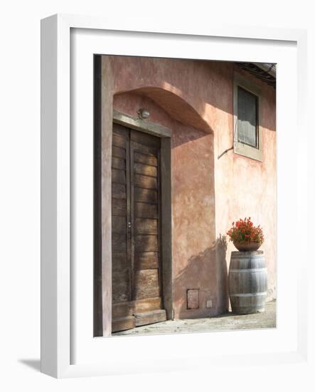 Europe, Italy, Tuscany. Flower Pot on Old Wine Barrel at Winery-Julie Eggers-Framed Photographic Print