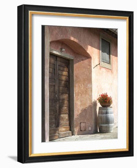 Europe, Italy, Tuscany. Flower Pot on Old Wine Barrel at Winery-Julie Eggers-Framed Photographic Print