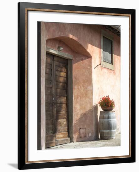 Europe, Italy, Tuscany. Flower Pot on Old Wine Barrel at Winery-Julie Eggers-Framed Photographic Print