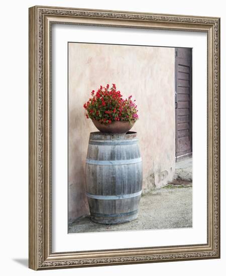 Europe, Italy, Tuscany. Flower Pot on Old Wine Barrel at Winery-Julie Eggers-Framed Photographic Print