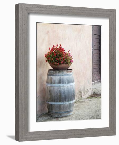 Europe, Italy, Tuscany. Flower Pot on Old Wine Barrel at Winery-Julie Eggers-Framed Photographic Print