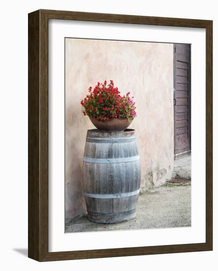 Europe, Italy, Tuscany. Flower Pot on Old Wine Barrel at Winery-Julie Eggers-Framed Photographic Print