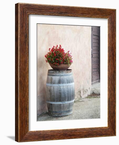 Europe, Italy, Tuscany. Flower Pot on Old Wine Barrel at Winery-Julie Eggers-Framed Photographic Print