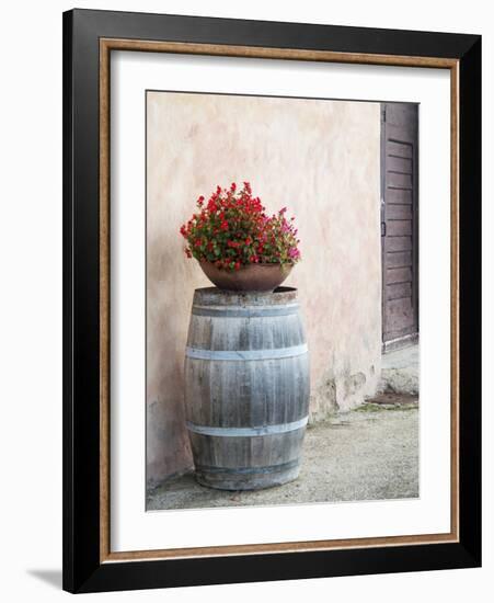 Europe, Italy, Tuscany. Flower Pot on Old Wine Barrel at Winery-Julie Eggers-Framed Photographic Print