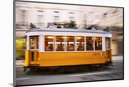 Europe, Portugal, Lisbon, a Speeding Tram (Streetcar) in the City Center-Alex Robinson-Mounted Photographic Print