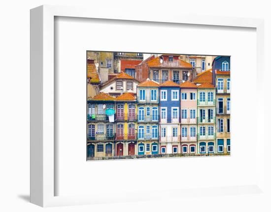 Europe, Portugal, Porto. Colorful building facades next to Douro River.-Jaynes Gallery-Framed Photographic Print