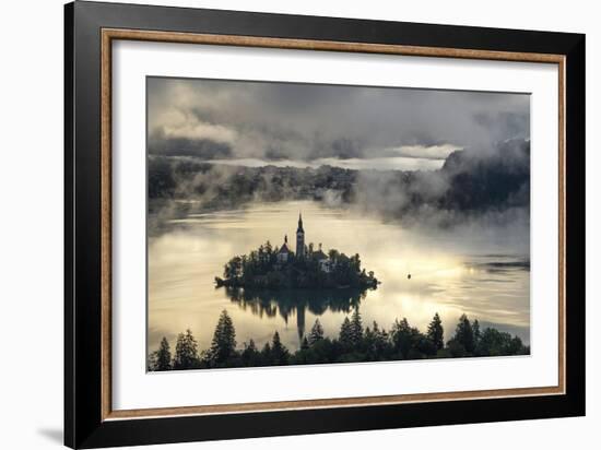 Europe, Slovenia, Bled - A Pletna Boat Arriving At The Island Of Lake Bled During A Foggy Sunrise-Aliaume Chapelle-Framed Photographic Print