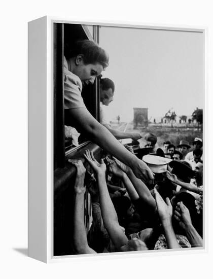 Eva Peron, Wife of Argentinean Presidential Candidate, Passing Out Campaign Buttons-Thomas D^ Mcavoy-Framed Premier Image Canvas