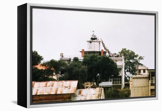 Evacuees Boarding a Helicopter-null-Framed Premier Image Canvas