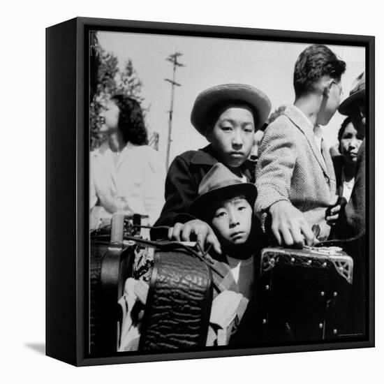 Evacuees of Japan Awaiting Turn for Baggage Inspection upon Arrival at Assembly Center During WWII-Dorothea Lange-Framed Premier Image Canvas