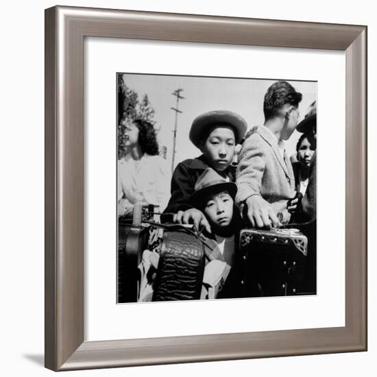 Evacuees of Japan Awaiting Turn for Baggage Inspection upon Arrival at Assembly Center During WWII-Dorothea Lange-Framed Photographic Print