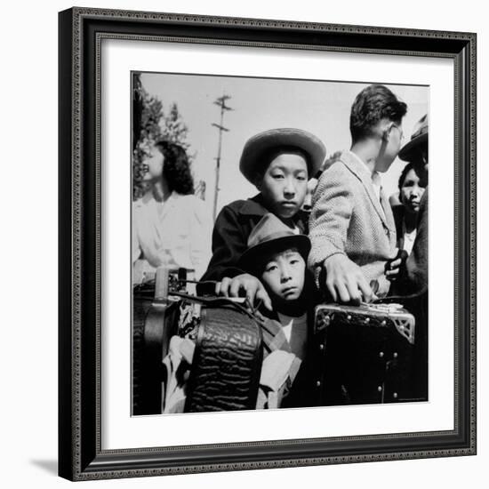 Evacuees of Japan Awaiting Turn for Baggage Inspection upon Arrival at Assembly Center During WWII-Dorothea Lange-Framed Photographic Print