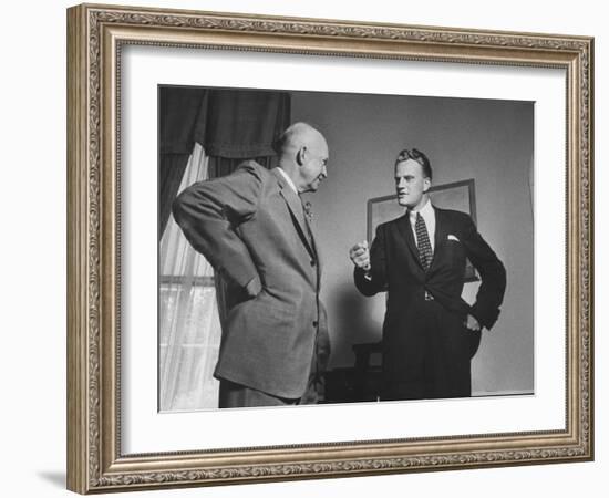 Evangelist Billy Graham Visiting with Pres. Dwight Eisenhower at the Wh-Paul Schutzer-Framed Photographic Print