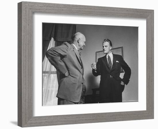 Evangelist Billy Graham Visiting with Pres. Dwight Eisenhower at the Wh-Paul Schutzer-Framed Photographic Print