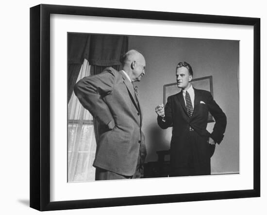 Evangelist Billy Graham Visiting with Pres. Dwight Eisenhower at the Wh-Paul Schutzer-Framed Photographic Print