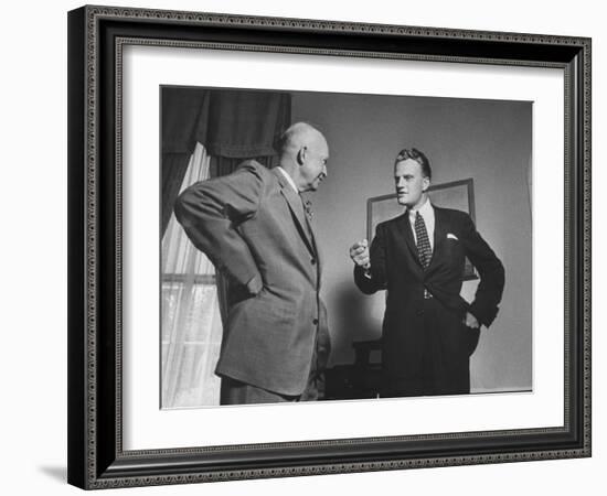 Evangelist Billy Graham Visiting with Pres. Dwight Eisenhower at the Wh-Paul Schutzer-Framed Photographic Print