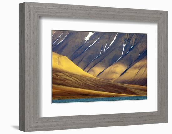 Evening Light Falls onto a Lonely House with Mountain Background-David Slater-Framed Photographic Print