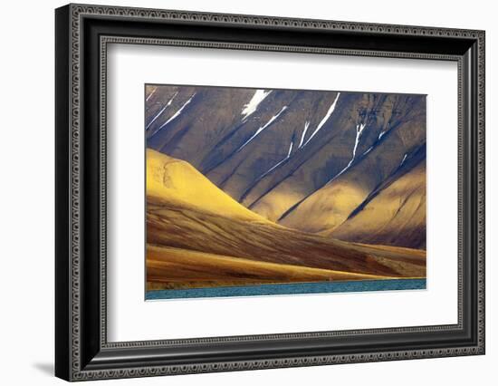 Evening Light Falls onto a Lonely House with Mountain Background-David Slater-Framed Photographic Print