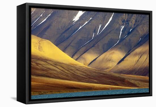 Evening Light Falls onto a Lonely House with Mountain Background-David Slater-Framed Premier Image Canvas