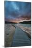 Evening Storm Clouds Gather Over A Boardwalk In Biscuit Basin, Yellowstone National Park-Bryan Jolley-Mounted Photographic Print