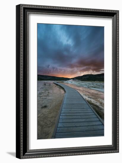 Evening Storm Clouds Gather Over A Boardwalk In Biscuit Basin, Yellowstone National Park-Bryan Jolley-Framed Photographic Print