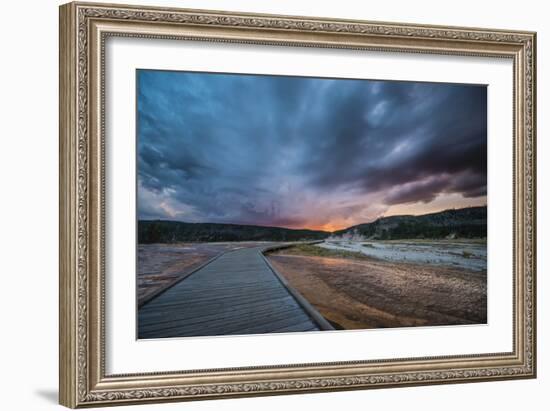 Evening Storm Clouds Gather Over A Boardwalk In Biscuit Basin, Yellowstone National Park-Bryan Jolley-Framed Photographic Print