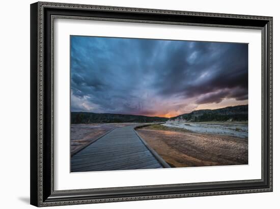 Evening Storm Clouds Gather Over A Boardwalk In Biscuit Basin, Yellowstone National Park-Bryan Jolley-Framed Photographic Print