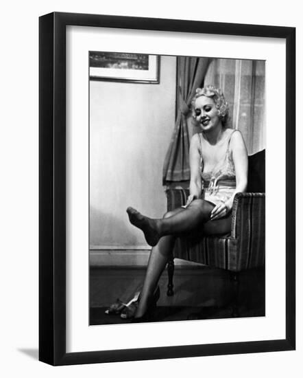 Ex-Burlesque Stripper June St. Clair Removing Stockings at the Allen Gilbert School of Undressing-Peter Stackpole-Framed Photographic Print