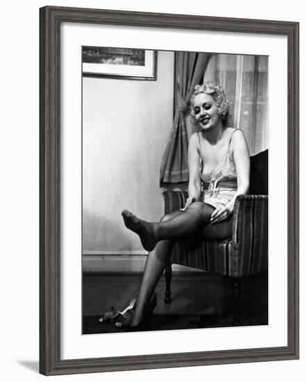 Ex-Burlesque Stripper June St. Clair Removing Stockings at the Allen Gilbert School of Undressing-Peter Stackpole-Framed Photographic Print