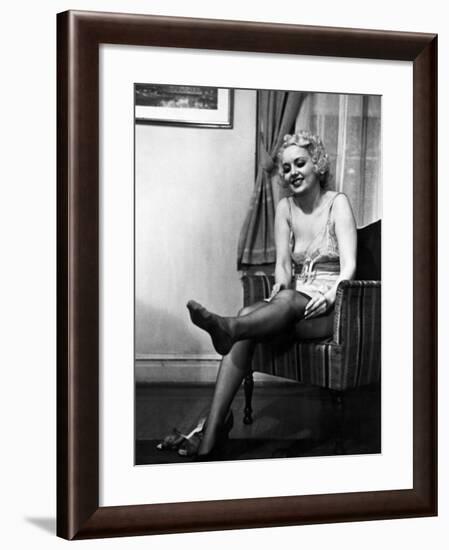 Ex-Burlesque Stripper June St. Clair Removing Stockings at the Allen Gilbert School of Undressing-Peter Stackpole-Framed Photographic Print