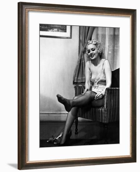 Ex-Burlesque Stripper June St. Clair Removing Stockings at the Allen Gilbert School of Undressing-Peter Stackpole-Framed Photographic Print